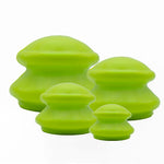 4 green suction cups in 4 different sizes