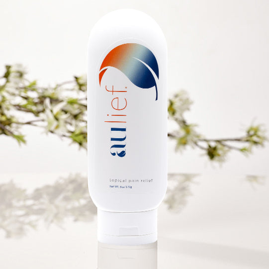 aulief topical pain relief cream 6oz tottle with tree twigs in the background